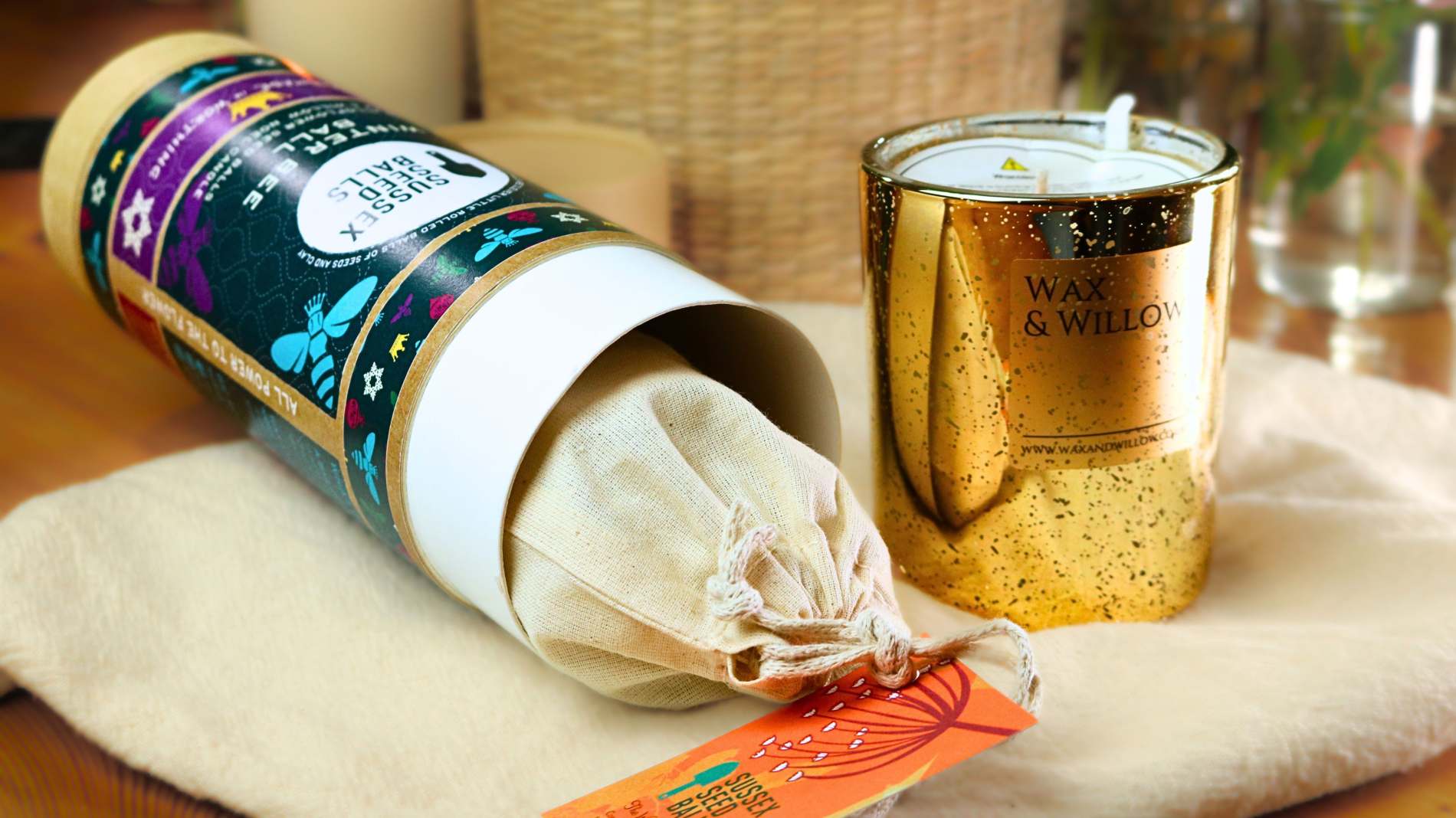 Festive gift tube, containing 10 wildflower seed balls, and 30cl "Noel" soy wax candle, by Wax & Willow - Image 2