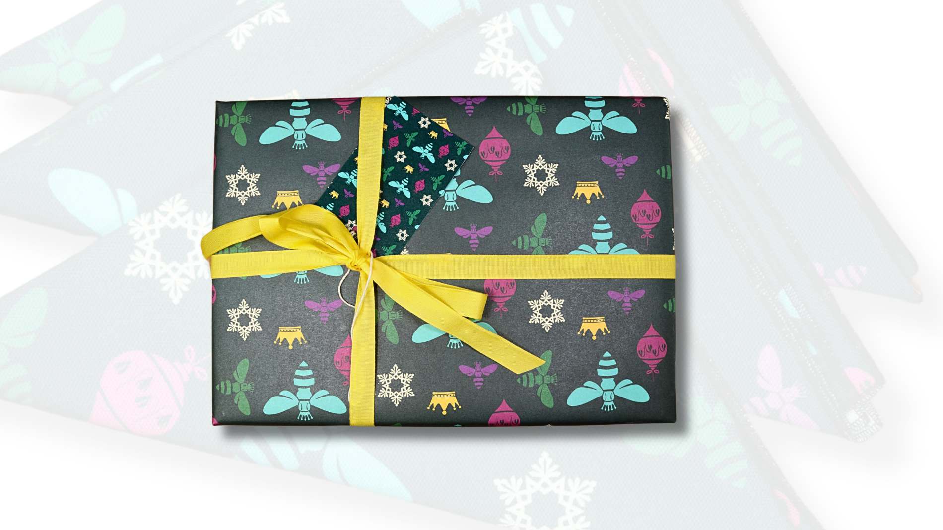 Festive-recycled-wrapping-paper-on-white_WinterBeeBall-scaled-1.jpg